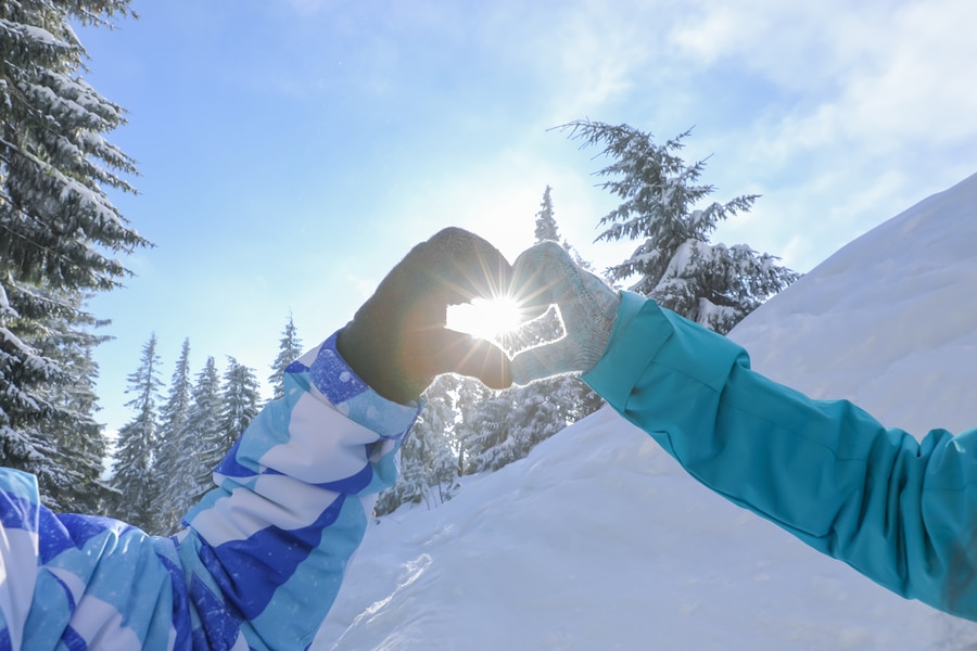 romantic couple on ski slope