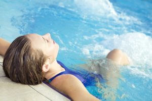 Women relaxing in a hot tub