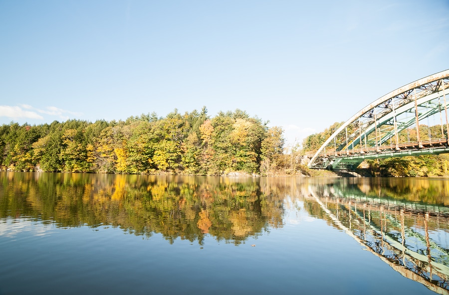view of Connecticut River, with fall foliage and iron bridge from Whetstone Restaurant