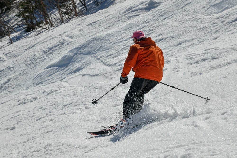 A man downhill skiing at Mount Snow, Vermont