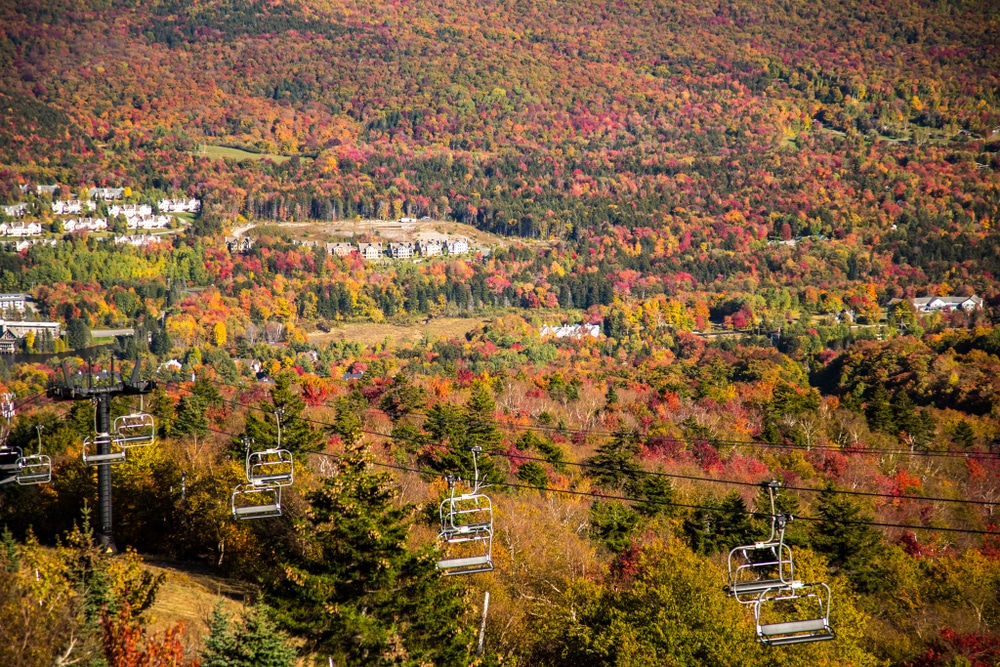 Take a Scenic Chairlift Ride at Mount Snow Vermont 4 View from the chair lift on Mt Snow Vermont,. Mt Snow and the surrounding lands are covered with dense hardwood forests, all exhibiting peak fall color.
